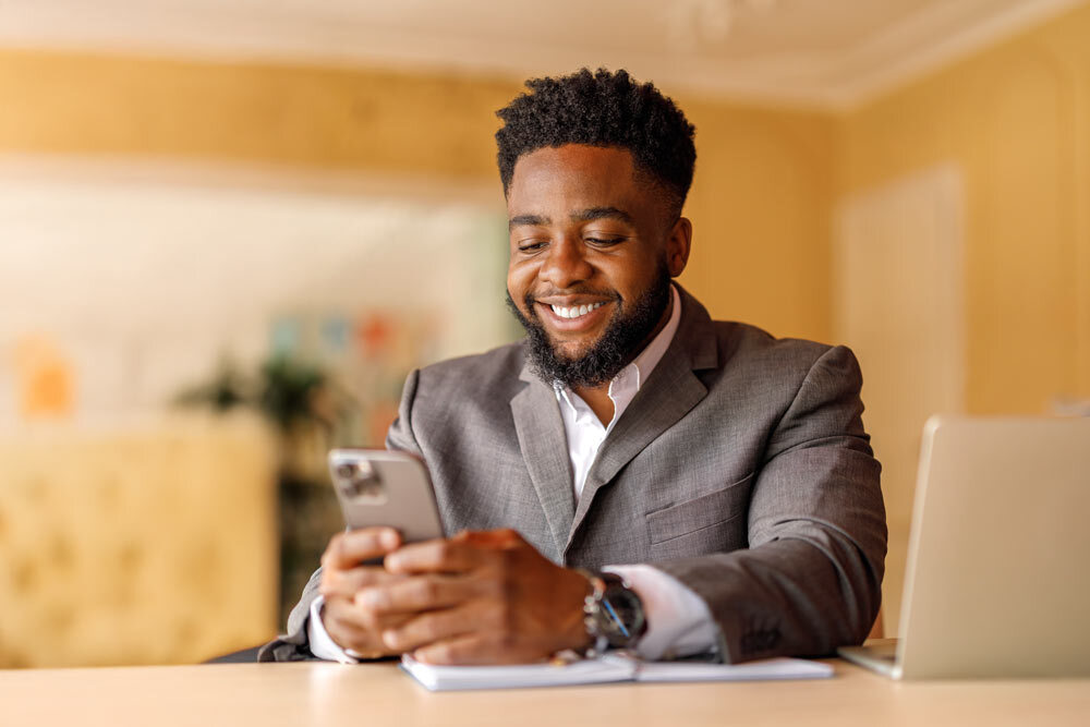 Texting man Getty Images chair 2229943216