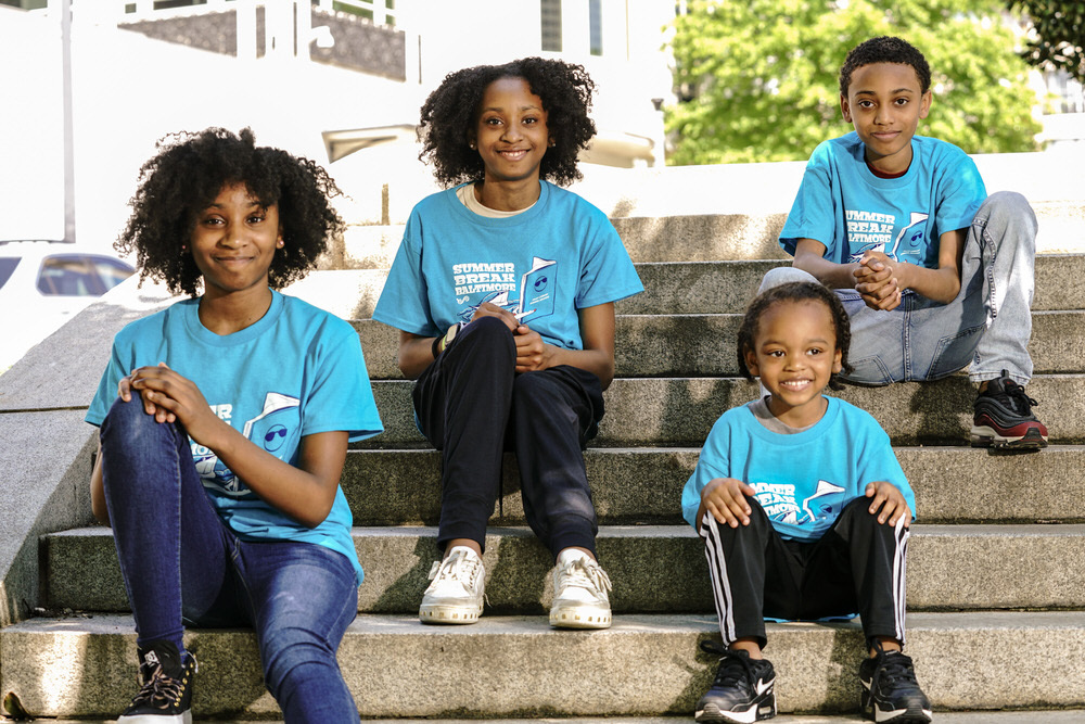 family members wearing 2024 Summer Break Baltimore shirts