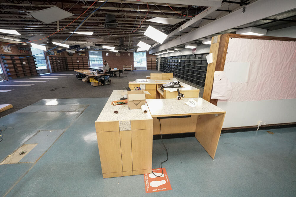Herring Run Branch closed for renovations - dark interior with desk