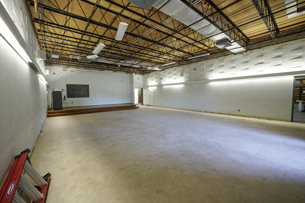 Herring Run Branch closed for renovations - dark and empty meeting room